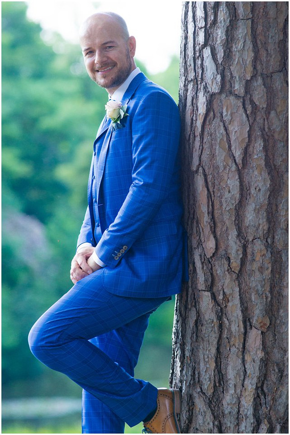 Formal groom portrait by Hampshire wedding photographer