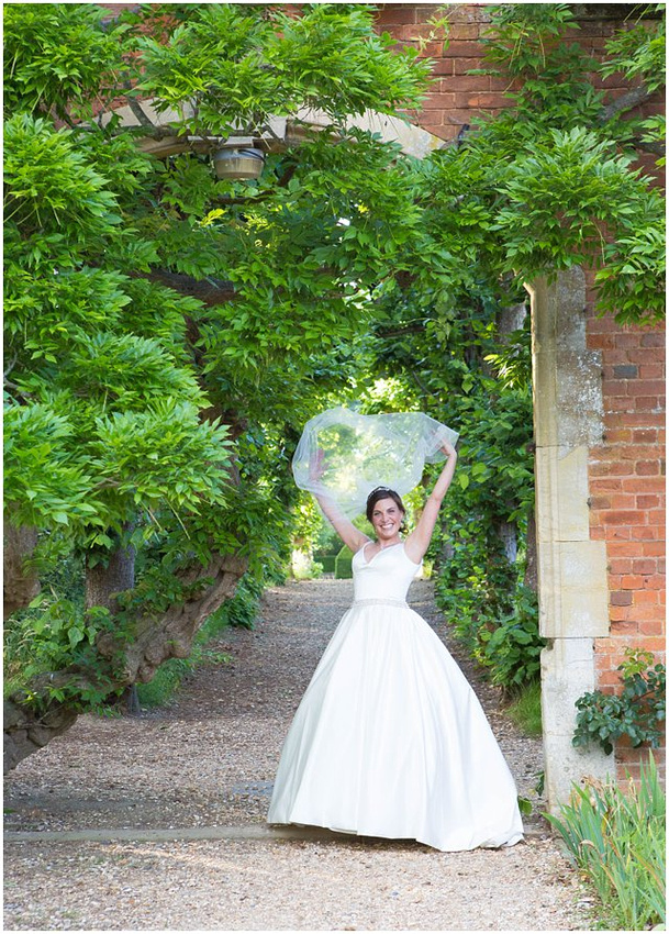 bridal portrait in gardens of tylney hall by hampshire wedding photographer