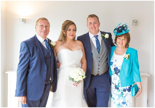 formal wedding photo of wedding guests at Wasing Park