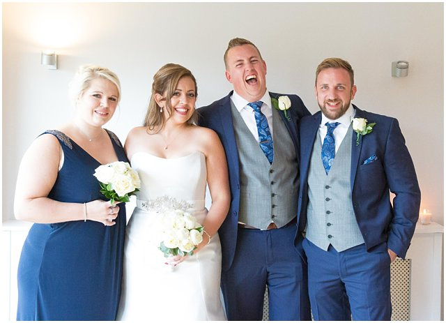 formal wedding photo of wedding guests at Wasing Park