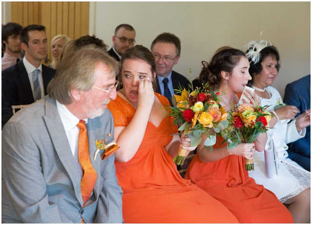 emotional bridesmaids during ceremony at Hyde Barn