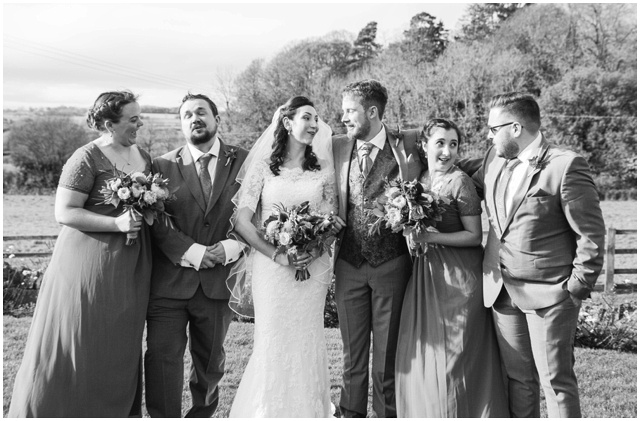 black and white photo of bridal party at Hyde Barn