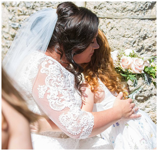 candid photo after wedding ceremony at St. Mary Magdalene Church 