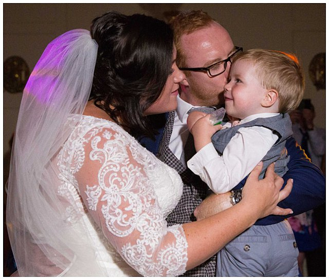 candid bride and groom photo at Hampden House wedding reception 