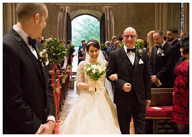 groom seeing his bride at wedding ceremony at St. Mary the Virgin Fairford