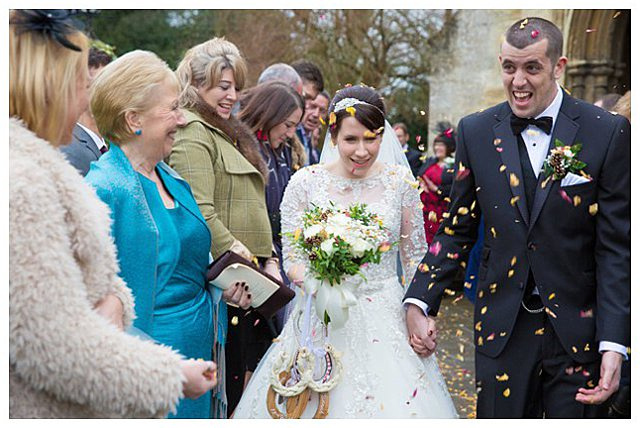 candid photo of church exit at wedding ceremony at St. Mary the Virgin Fairford