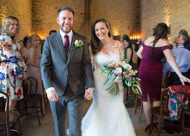 just married couple at stone barn wedding venue gloucestershire